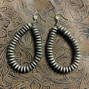 Teardrop pewter colored earrings for pierced ears.
